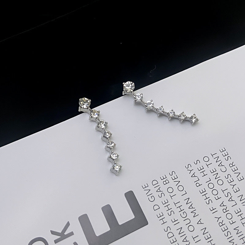 Boucles d'oreilles diamant sept étoiles